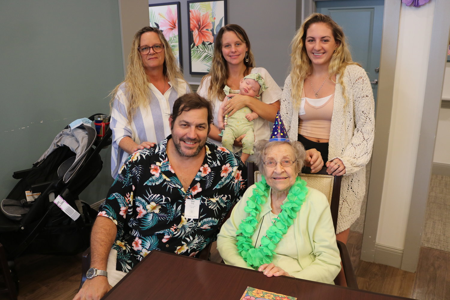 Dorothy Coy celebrated her 102nd birthday June 25 at Starling at Nocatee Assisted Living & Memory Care with members of her family gathered around. From left are: sitting, Matt Coy and Dorothy Coy; standing, Jennifer Coy, Chanel Peddicord holding baby Willow, and Cameron Coy.